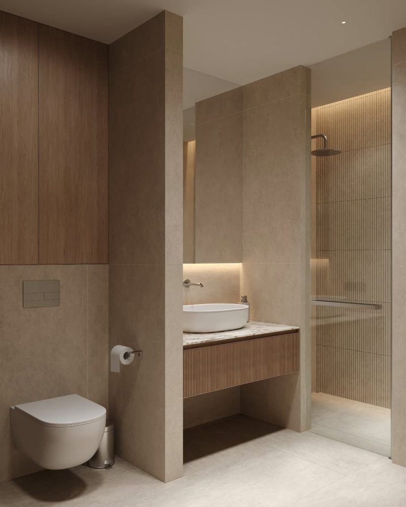 Renders interiores de un baño moderno con tonos neutros.