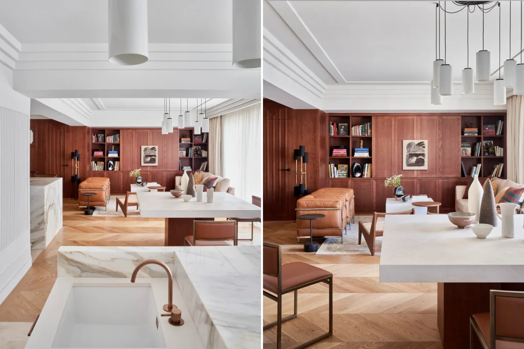 Salón reformado por Juan Bengoa Interiorismo con mucho protagonismo de mármol blanco y madera de roble